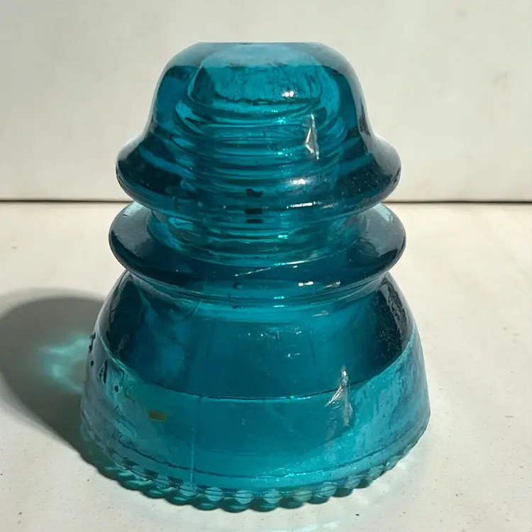 Vintage blue green teal glass insulator 4.5" x 3.75" made in the USA