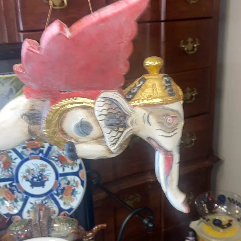 Hand carved hand painted flying elephant