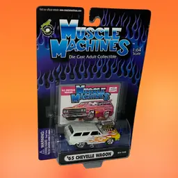 MUSCLE MACHINE. 1:64. 65 CHEVELLE WAGON. WHITE WITH FLAMES. 02-106.