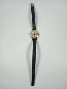 FOR PARTS OR REPAIR Vintage Timex Women's Gold Tone Manual Wind Watch Black Strap
