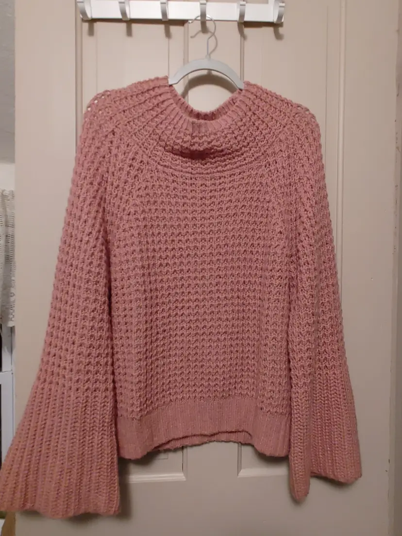 Top- Brand: Maeve by Anthropology. Size Medium. Pink sweater. Material: 47% nylon, 28% wool, 24% acrylic, 1% elastane. No callouts.