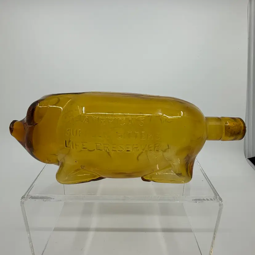 Vintage Amber Glass Suffolk Bitters Pig Americas Life Preserver Bottle