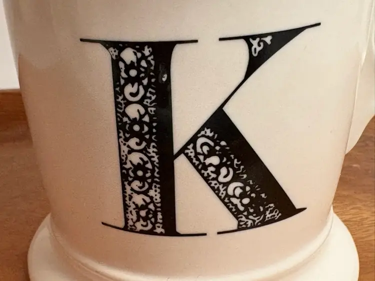 Anthropologie The Bistro Tile Monogram Stoneware Mug with the letter 'K