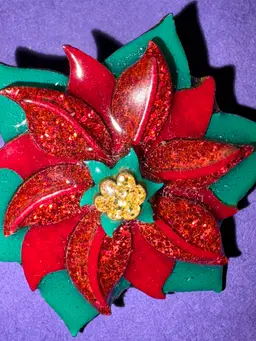 Designs By Lucinda ~ Hard To Find Vintage Christmas Poinsettia Flower Pin / Brooch With Glittery Red Petals And Green Leaves In The Background. Shimmery And Dimensional!