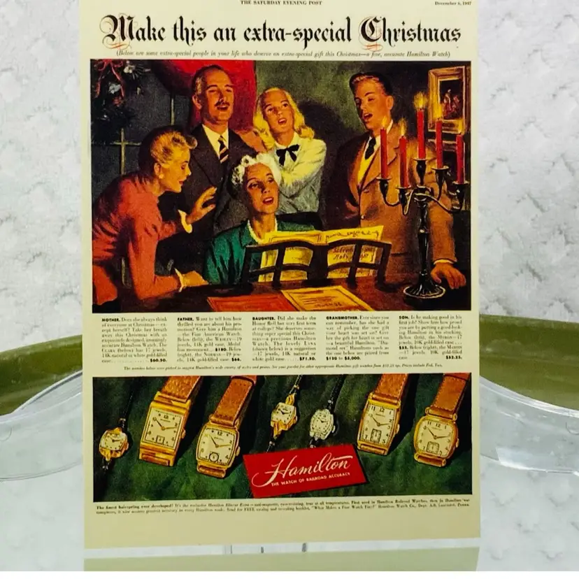 Vintage Christmas Postcard An actual Christmas ad appearing in the Saturday Evening Post in 1947 produced by Hamilton. For a free brochure and a listing of authorized Hamilton dealers in your area. Hamilton
AMERICA'S TIMEKEEPER SINCE 1892
© Hamilton Watch, a div. of SMH (US) Inc. Postcards. Offices in: NYC, BOS, DC, ATL, So. FLA, CHI, DAL, SEA, LA, 57. 212.873 4200