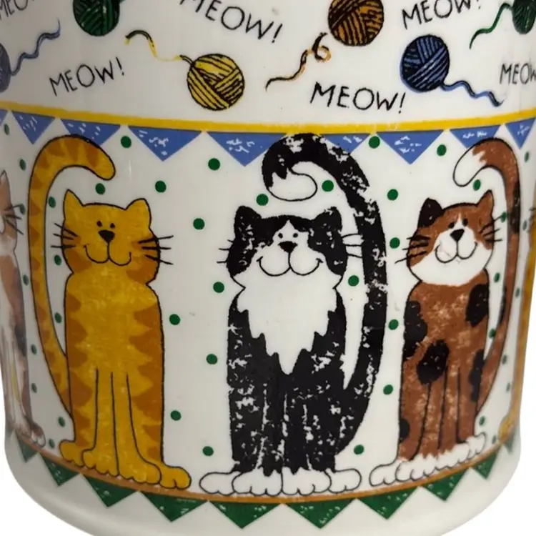 Vintage Ceramic Cookie/Storage Jar Multicolor Cats Animation Benjamin Medwin 1999 Yellow Yarn Ball Finial
9-3/4” T x 6-1/4” W