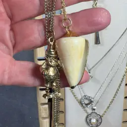 2 Gold tone Necklaces Leprechaun And Shell Pendants Raid