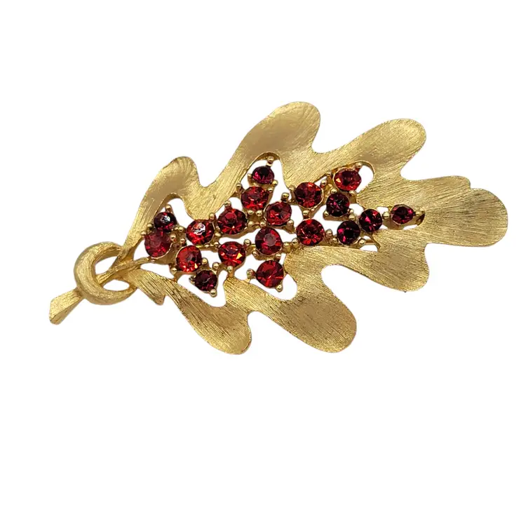 Vintage JJ Brushed Gold Tone Oak Leaf Brooch With Red Rhinestones