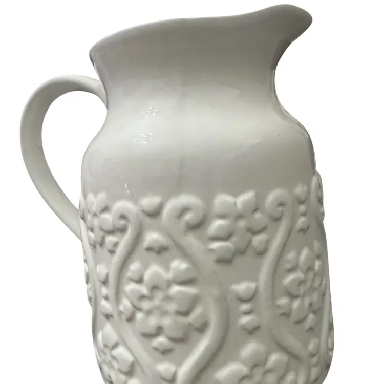 Large White Farmhouse Ceramic Pitcher With Embossed Floral Design