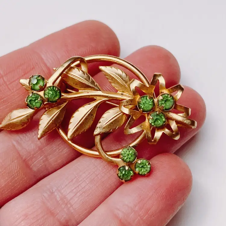 Mid Century Gold Tone Green Rhinestone Floral Brooch Prong Set 1950s Openwork
