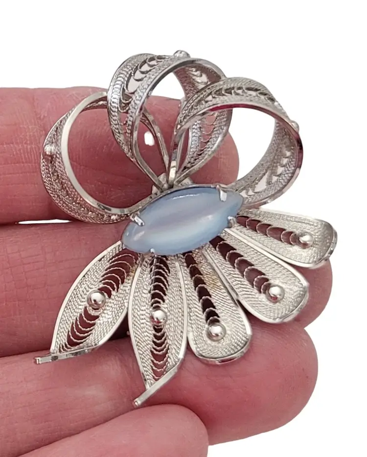 Alice Caviness Spun Sterling Sterling Filigree Ribbon Bow Blue Moonstone Rhinestone Brooch, Signed E708