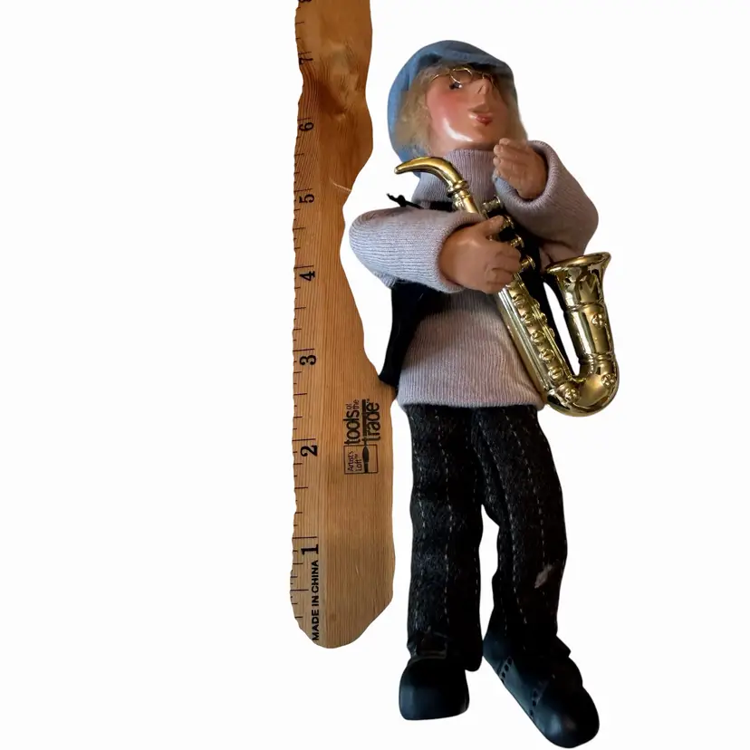 Kindles line from Byers' Choice Ltd., specifically a "Musician" character often referred to as a Jazz Player or Saxophone Player