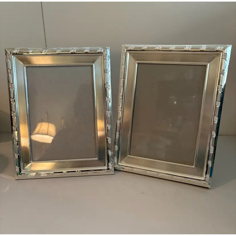 A Pair Of Matching 5 X 7 Silver tone Picture Frames