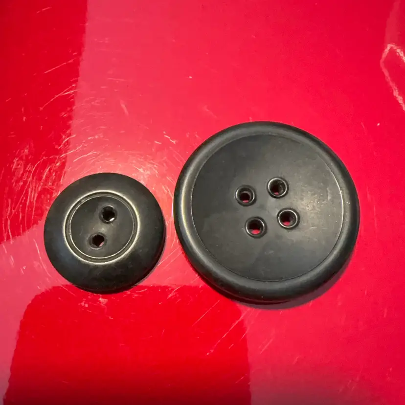 Two Vintage Goodyear Hard Vulcanized Rubber Buttons