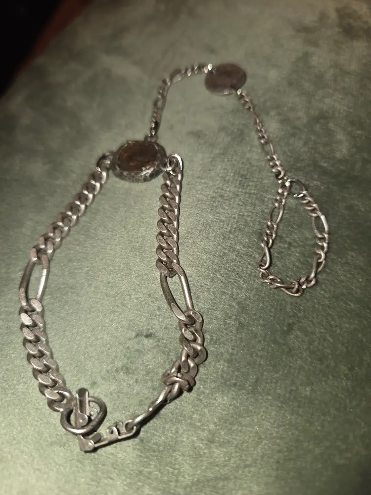 TAT2 Finger Bracelet featuring coins