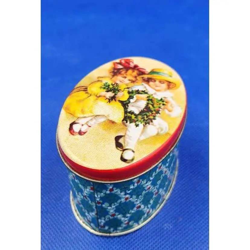 Vintage trinket tin box with little girls and flowers