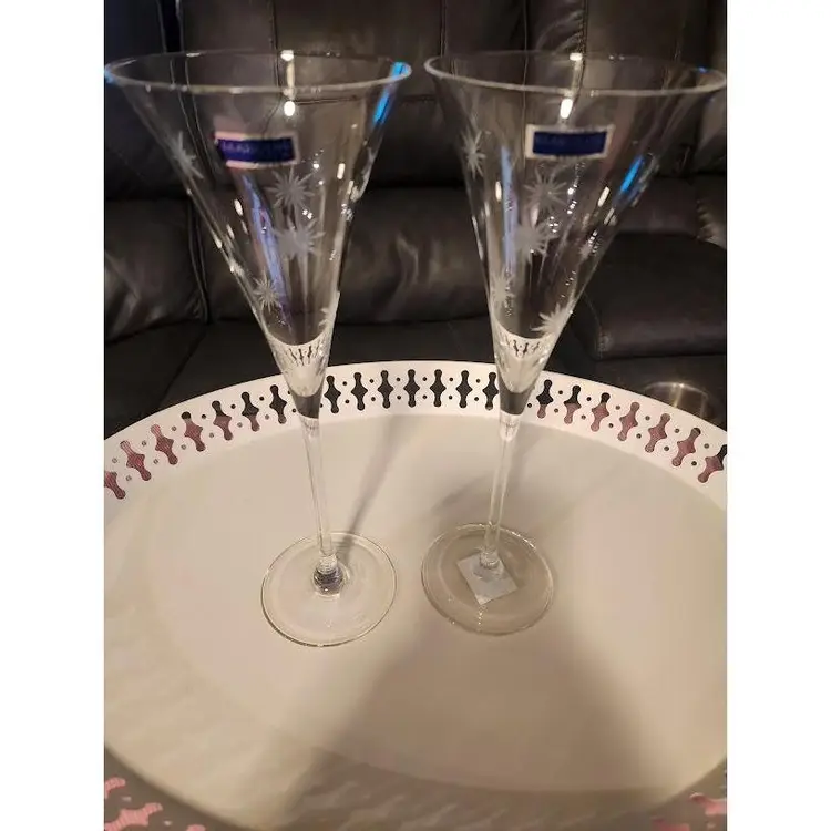 Pair of Marquis By Waterford Crystal "Celebration" Starburst Etched Toasting Flutes