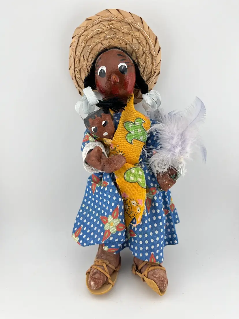Mexican Folk Art Paper/Fabric Mache, Mom holding baby-and also holding feathers.
