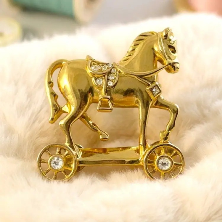 Avon Smithsonian Toy horse brooch rhinestone gold 1980s Signed Collectible VTG