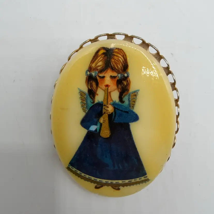 Angel With Horn Oval Ceramic Brooch