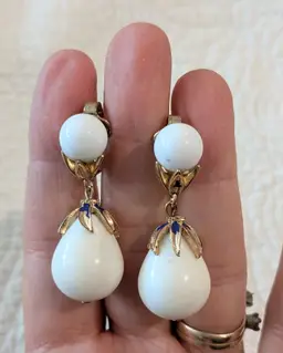 Vintage Trifari Clip On Earrings in Gold Tone with a White Plastic Bead Teardrop