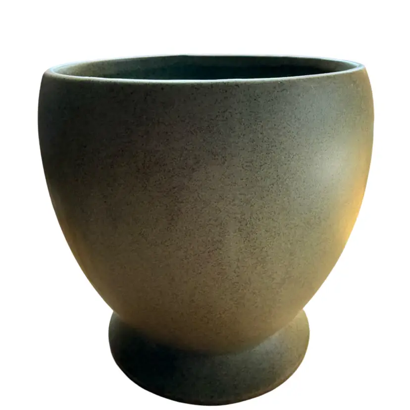 vintage McCoy Floraline sage green ceramic planter with a matte speckled glaze and a flared base