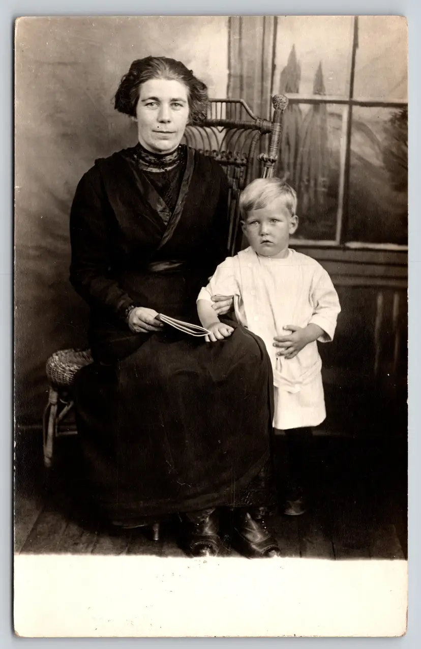 Postcard RPPC Happy Mother Holding Paper Sitting with Son Real Photo Children - 9413