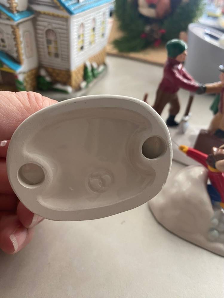 Department 56 kids playing in the snow figurines