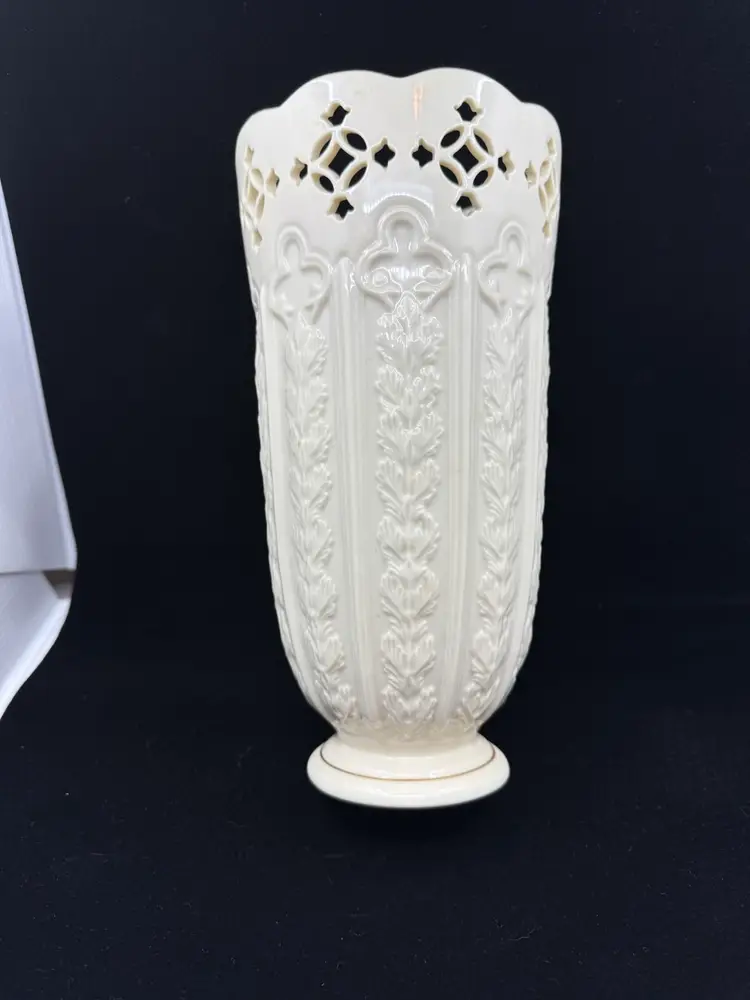 A Lenox porcelain vase with Fleur De Lis pattern and gold trim