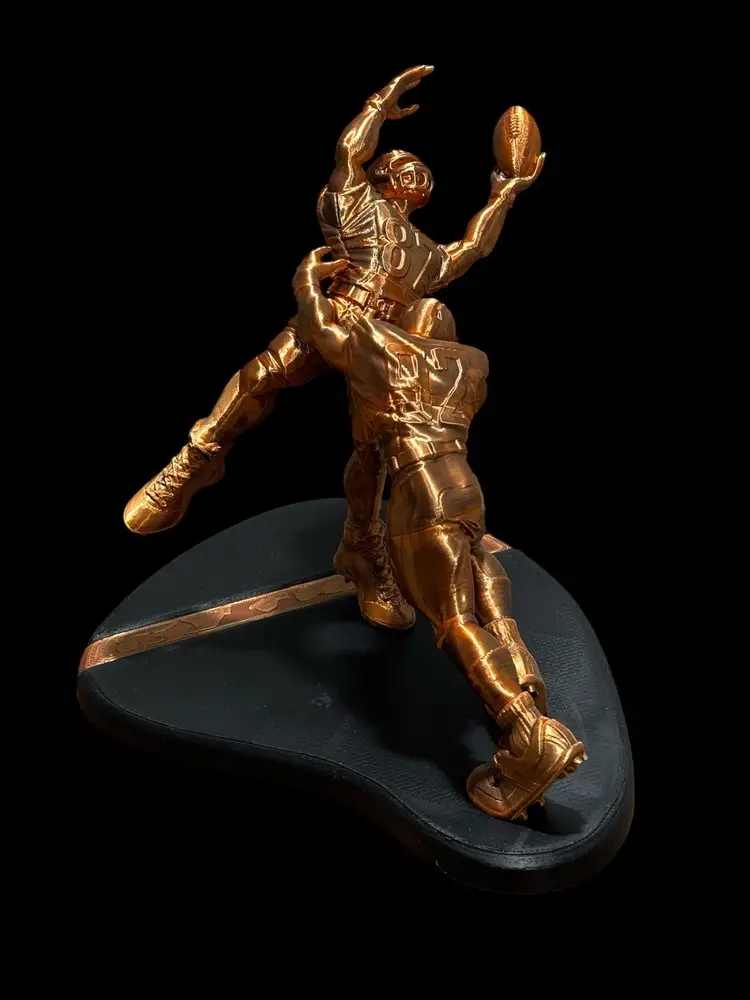 Game-Winning Touchdown Football Sculpture – Dynamic Sports Art Collectible