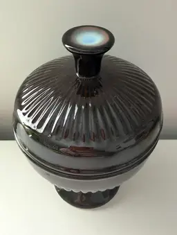 Black Candy Dish With Lid. Blue Colour On The Lid’s Handle And In The Middle Of The Dish. 

Unique.