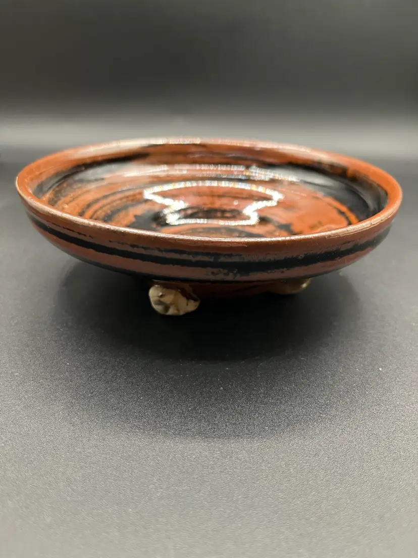 Signed Copper Brown & Black Swirl 4-Footed Bowl 6.5”