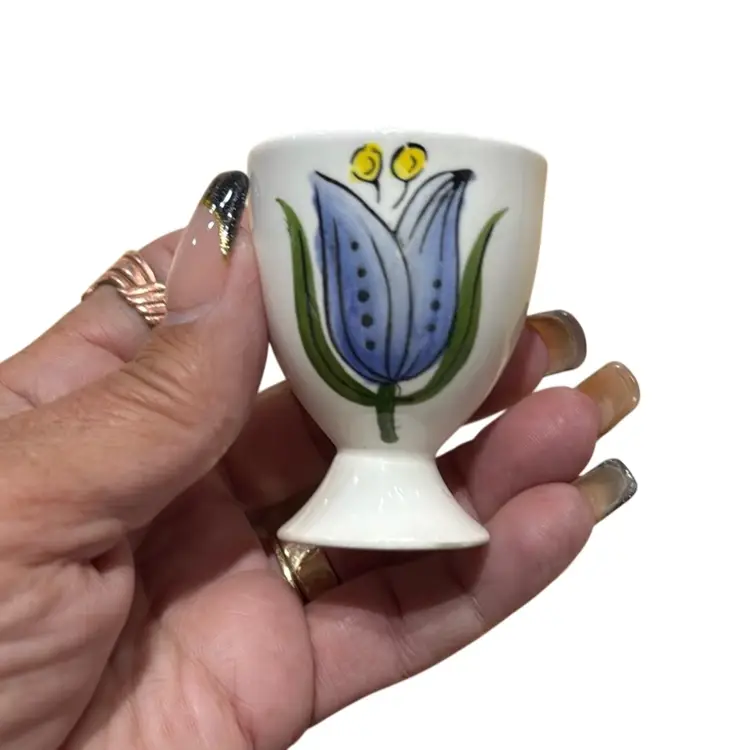 Three vintage Roullet Renoleau egg cups from Charente, France