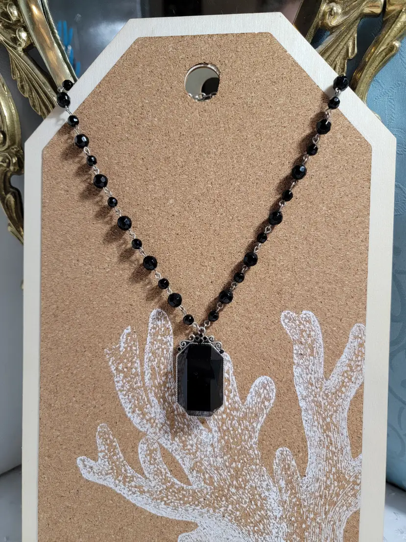 Black glass beaded necklace with faux onyx pendant