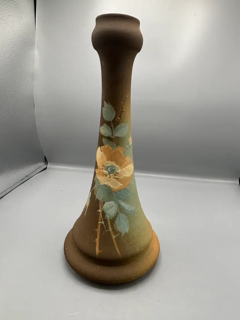 Brown vase with flowers
