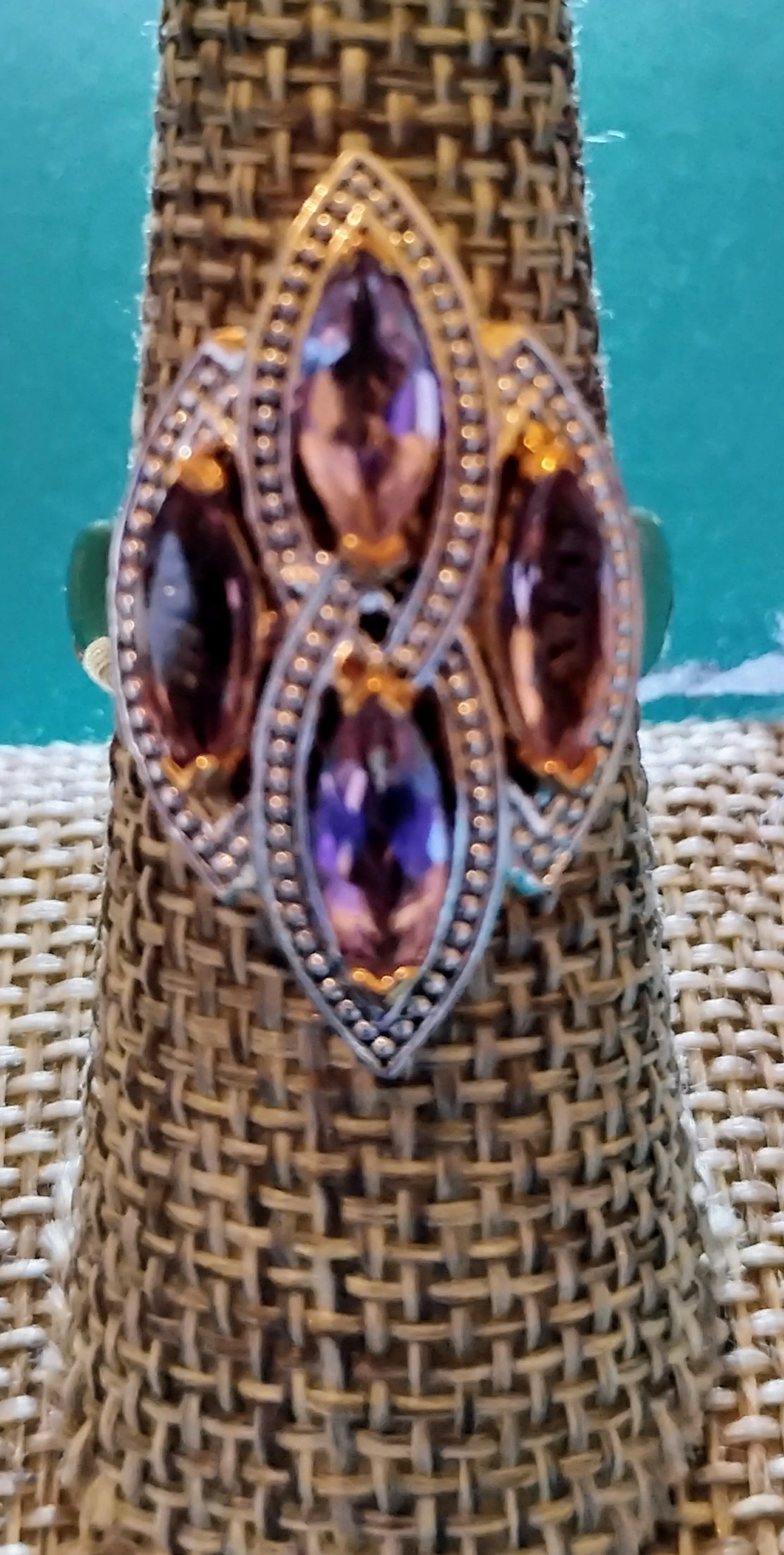 Ring is 925 Silver, New With Tag, Size 8, 4-Aymethest, 1-Diamond next to the Makers Initials on the side of the ring.