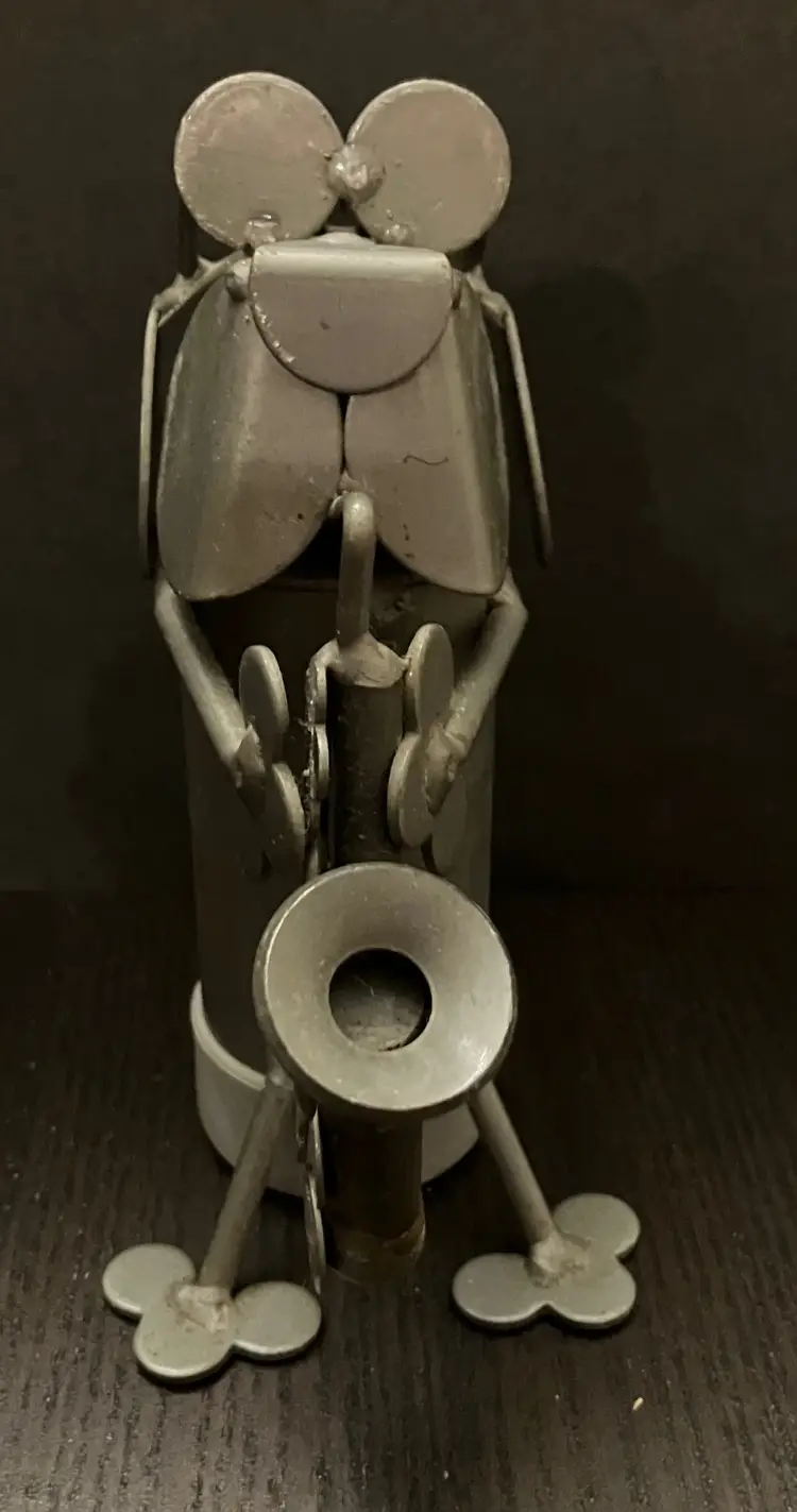 Handcrafted scrap metal sculptures of musical figures Cat and Dog