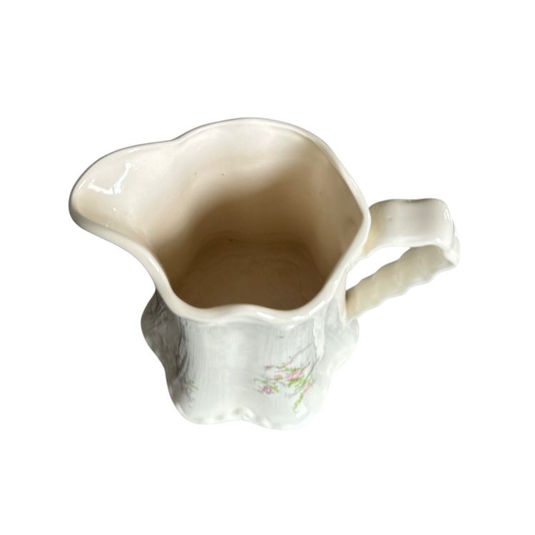 White Mold Ceramic Pitcher with Flower Design