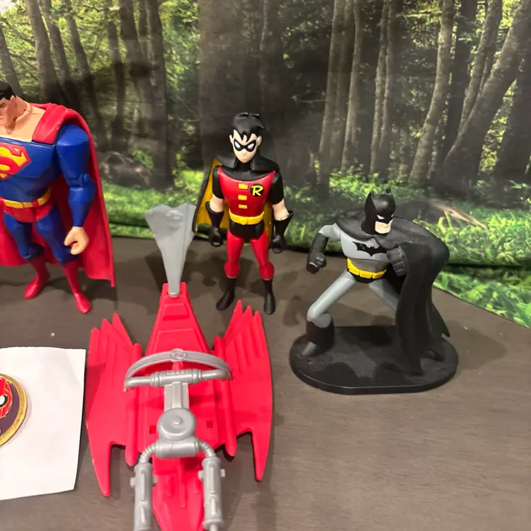 Dc Characters With Some Random Figures, Batman, Superman, And Robin
