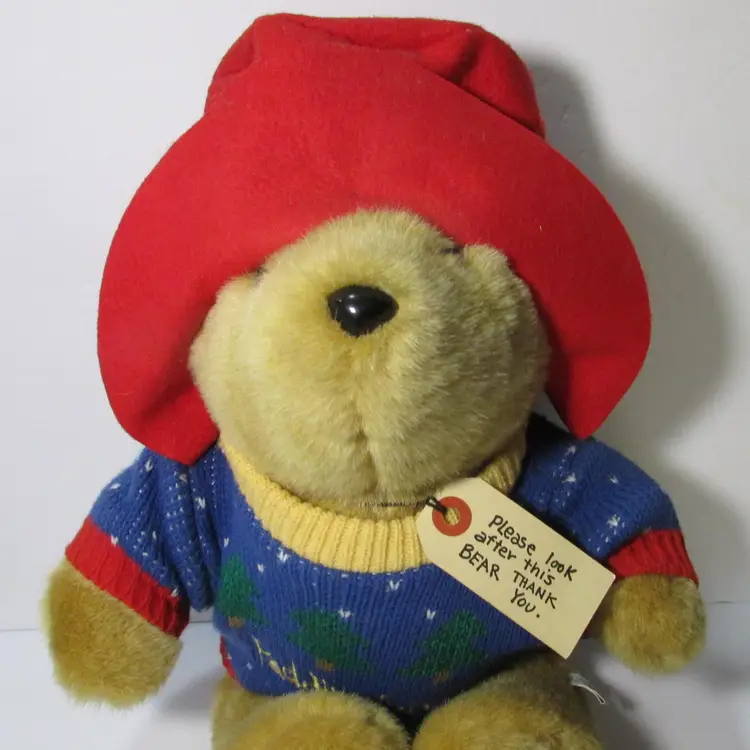 vintage Paddington bear stuffed teddy bear in holiday sweater Eden plush