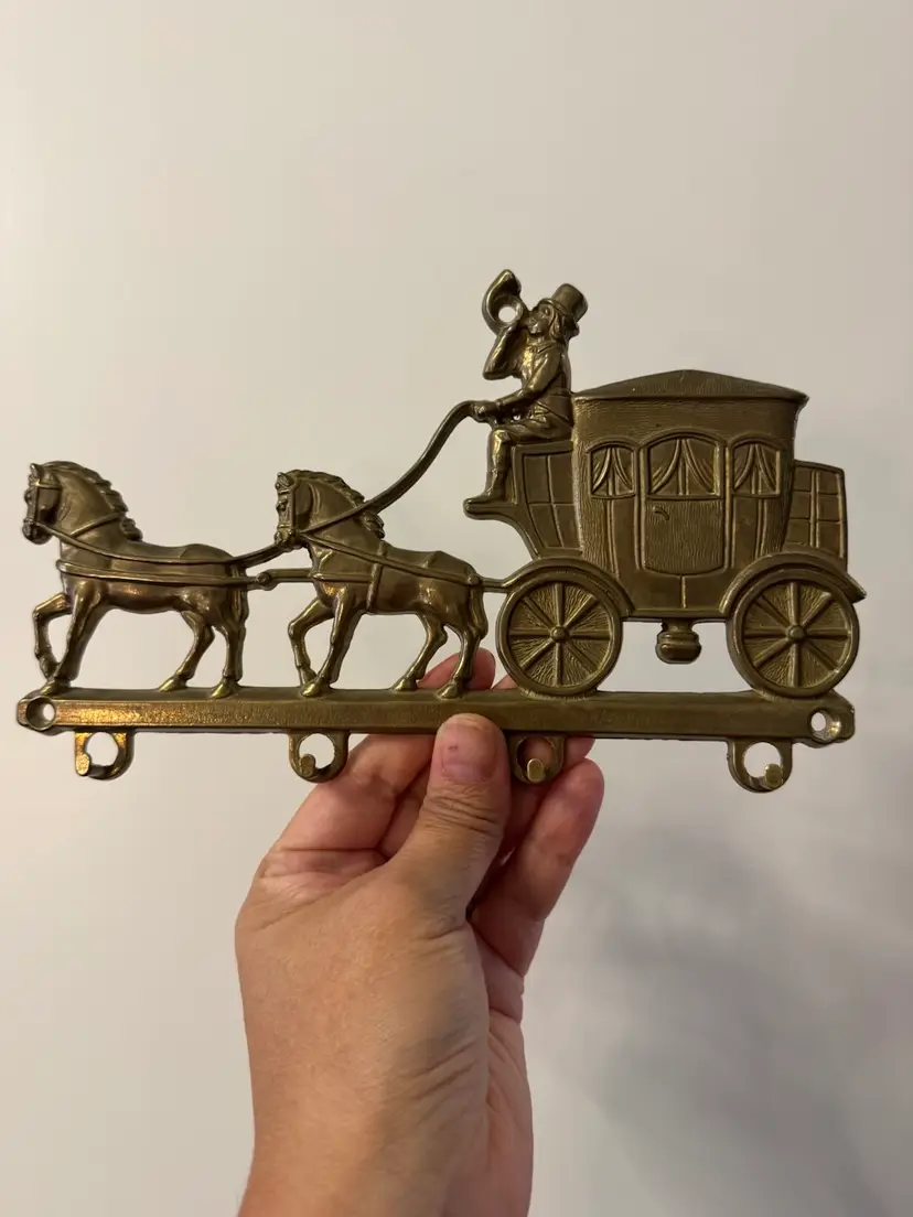 vintage solid 1960s Walt Disney production brass wall-mounted key holder, horses & stagecoach.