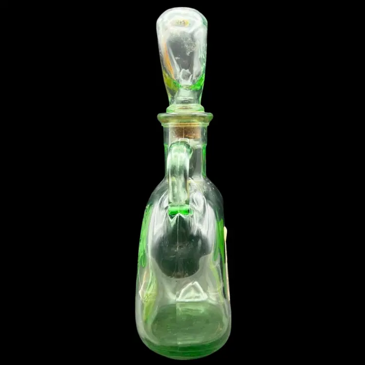 #243B Vintage ‘1849 Flagship’ Green Glass Decanter for Old Fitzgerald Whiskey. This Bottle was Released in the 1960’s to Commemorate the USS Constitution Which Is Depicted On The Front Of The Bottle. The Whiskey was Produced by the Stitzel-Weller Distillery