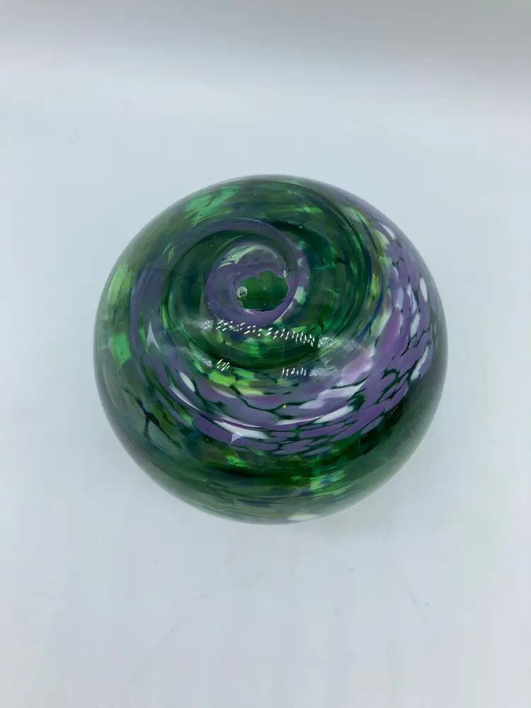 Green and Purple Swirls in a Glass Paperweight, Stamped 'Made by ME'