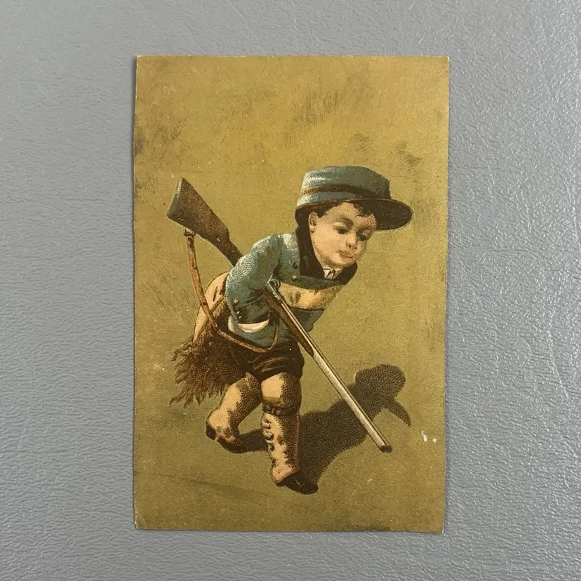 Victorian Trade Card Boy Hunting Edward Conner Merchant Tailor Fitchburg Mass 4x2.75"
