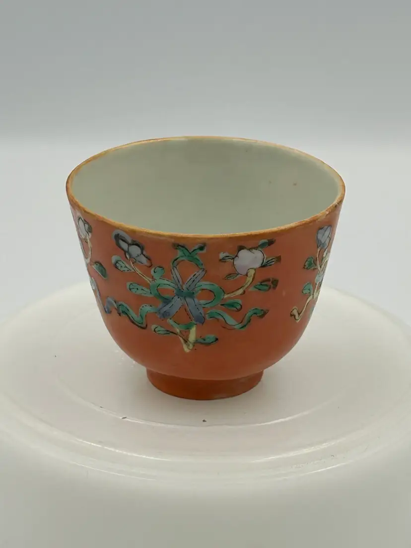 Vintage/antique Asian tea bowl/cup orange with multicolored floral design porcelain