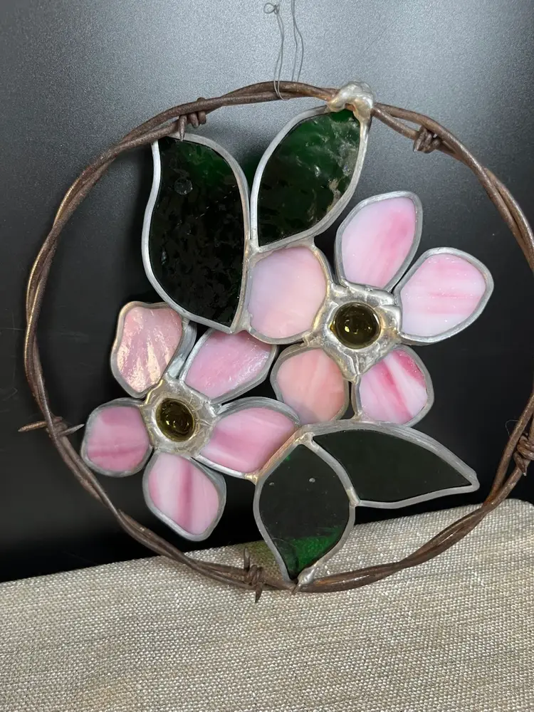 Beautiful Stained Glass Wild Prairie Rose w/ Barbed Wire Border. The State Flower of North Dakota-Wild Prairie Rose-Designated in 1907. Features 5 Pink Petals & Can Be Found in Road Side Ditches & Pastures