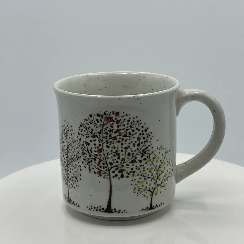 Speckled stoneware mug fruit apple tree