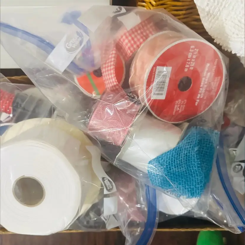 101. Two large bags of ribbons