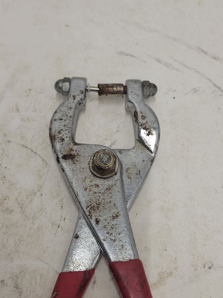 Ceiling Grid Punch Pliers. Grid Punch for 1/8" Rivets. Punches 9/16" Grid