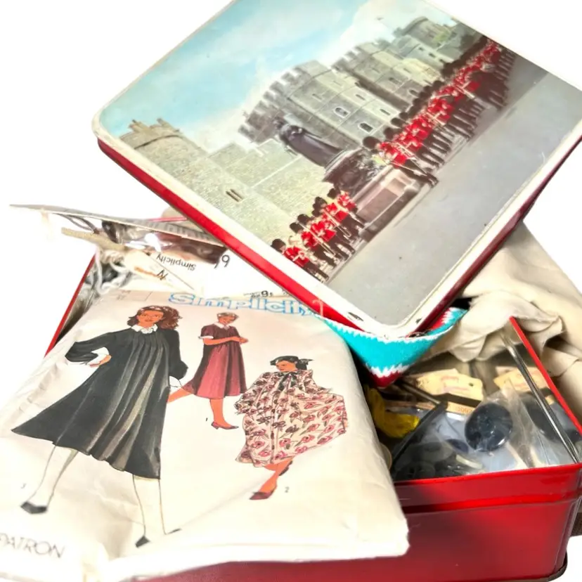 Vintage British Windsor Castle Red Metal English Biscuit Cookie Tin with Sewing Trinkets. Graphic Of Royal Marching Band. 9” x 8-1/2” x 2-1/2”